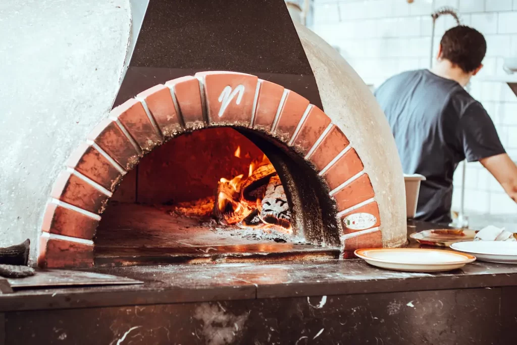 Cooking in a commercial pizza oven